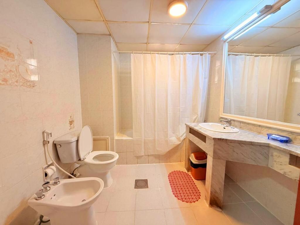 Private bathroom with bath, shower and bidet